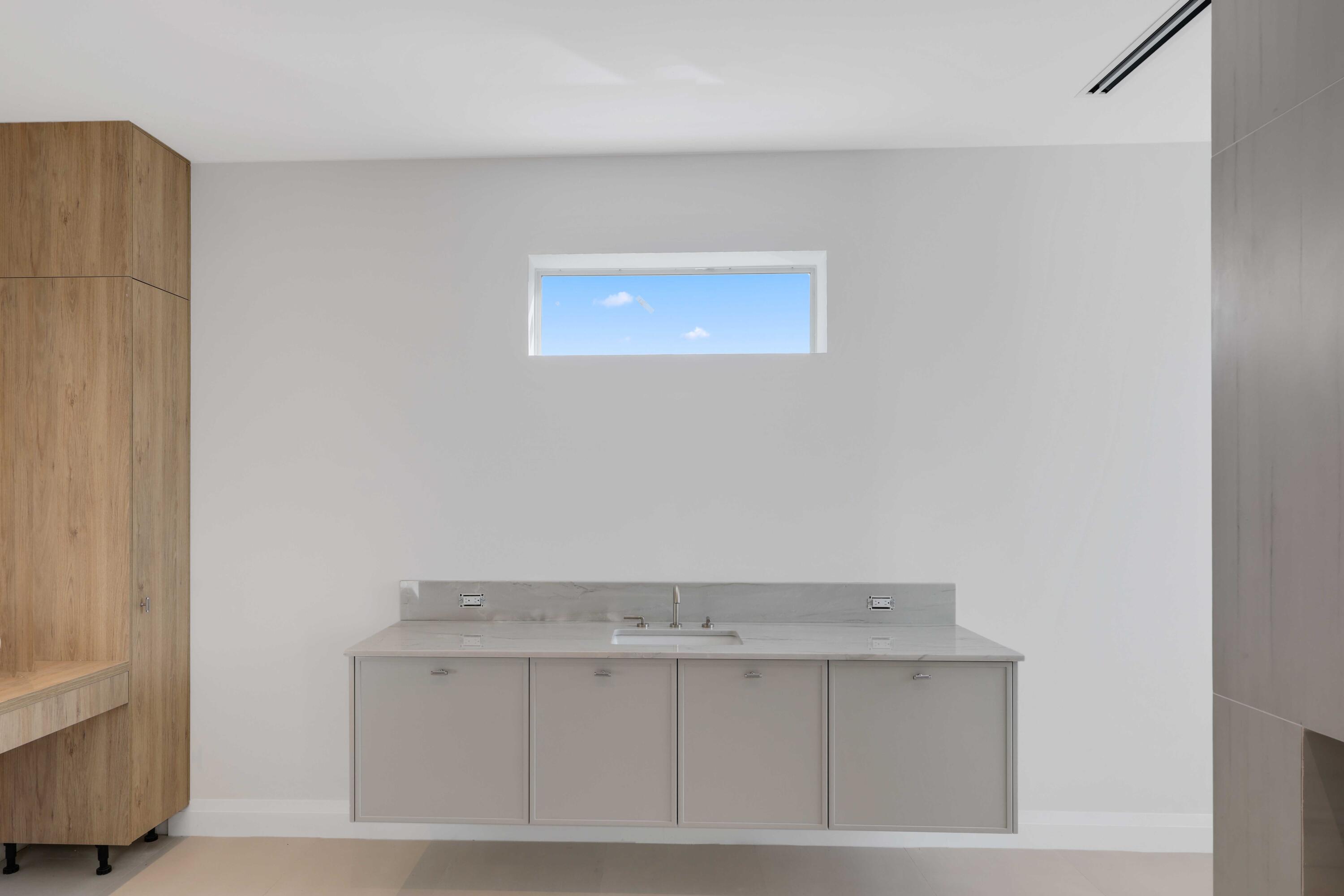 810 Northeast 70th Street Boca Raton, FL 33487 - Photo 23 of 32 a view of utility room