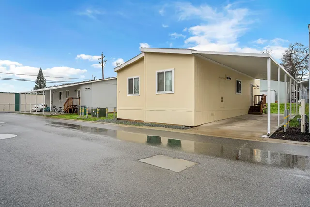 a view of a house with a street