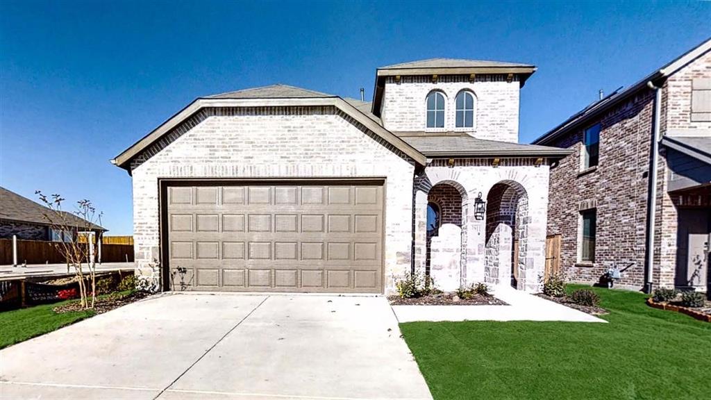 3911 Rochelle Lane Crandall, TX 75114 - Photo 1 of 1 a front view of a house with a garden
