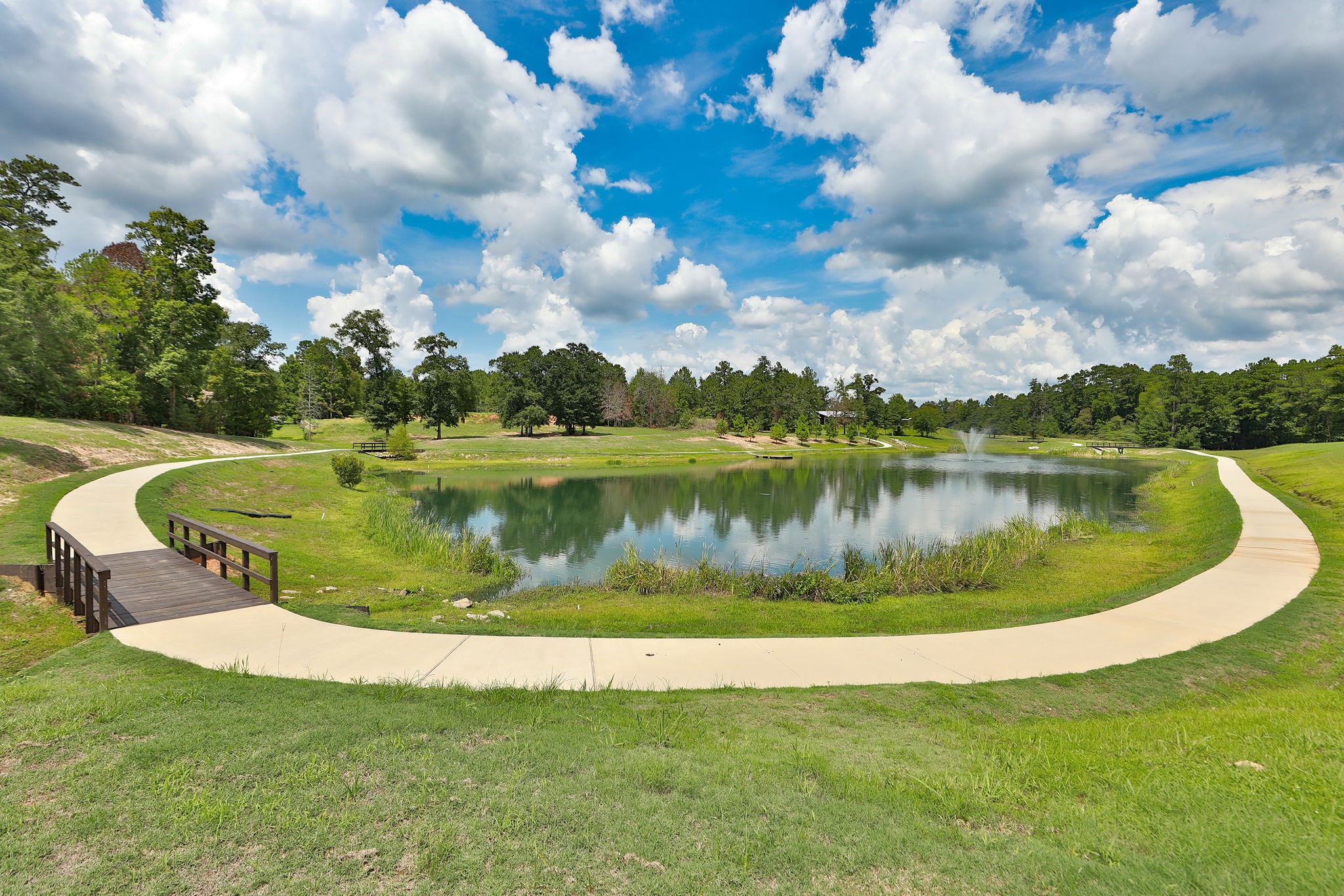 6918 Comanche Bend Montgomery, TX 77316 - Photo 50 of 50 High Meadow Estates offers outstanding amenities including a recreation center with resort-style swimming pool, tennis court, pickleball courts, and a playground. There is a 4-acre nature preserve with walking trails and a community lake. Call your agent or Paula to schedule your private tour! Low Tax Rate! NO MUD TAX! Priced below recent APPRAISAL!