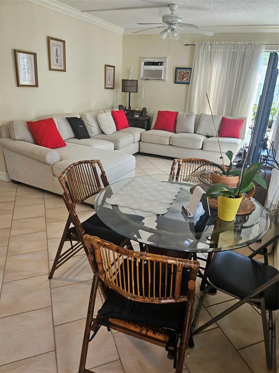 1045 Southeast 15th Street, Unit 13C Fort Lauderdale, FL 33316 - Photo 6 of 20 a living room with furniture and a wooden floor