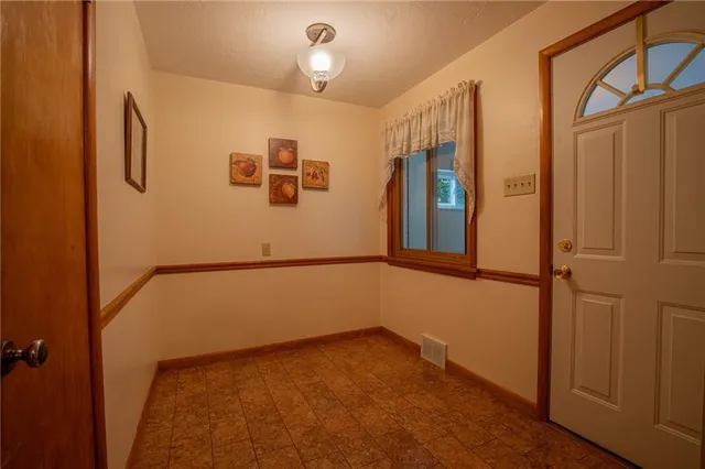 a view of a room with windows