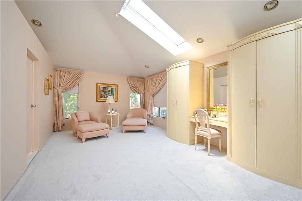 29 Kansas Place Brooklyn, NY 11234 - Photo 13 of 24 a living room with furniture and a table