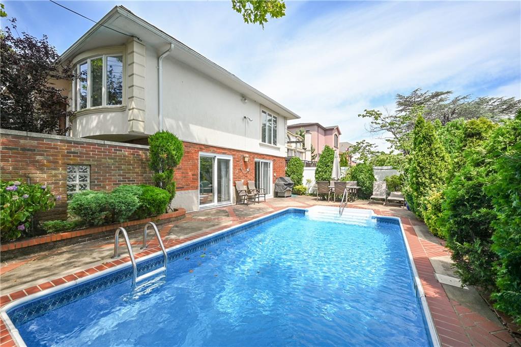 29 Kansas Place Brooklyn, NY 11234 - Photo 23 of 24 a view of house with swimming pool outdoor seating