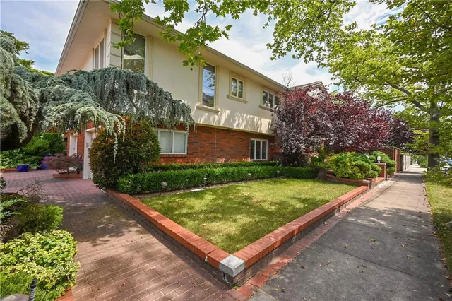 a view of a building with a yard