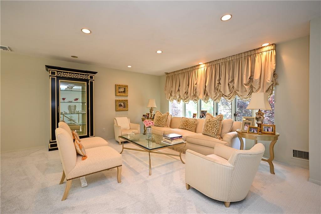 29 Kansas Place Brooklyn, NY 11234 - Photo 3 of 24 a living room with furniture and a large window
