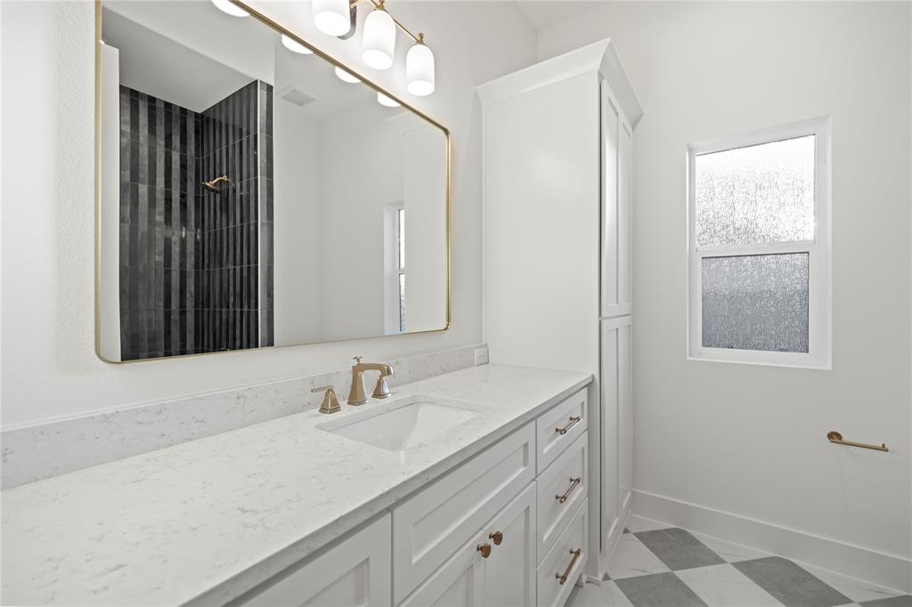 108 Bel Grand Road Haslet, TX 76052 - Photo 10 of 40 Full bathroom featuring vanity, light flooring, and a shower