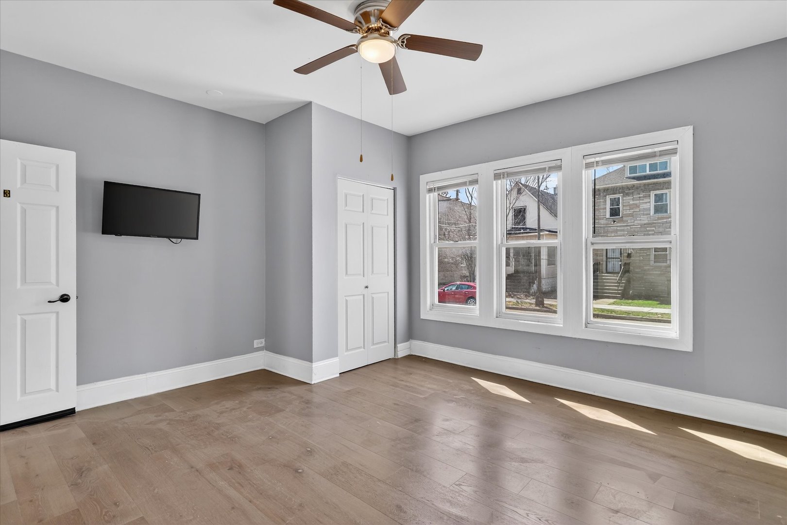 1 East 114th Street Chicago, IL 60628 - Photo 13 of 33 a view of an empty room with a window and a kitchen