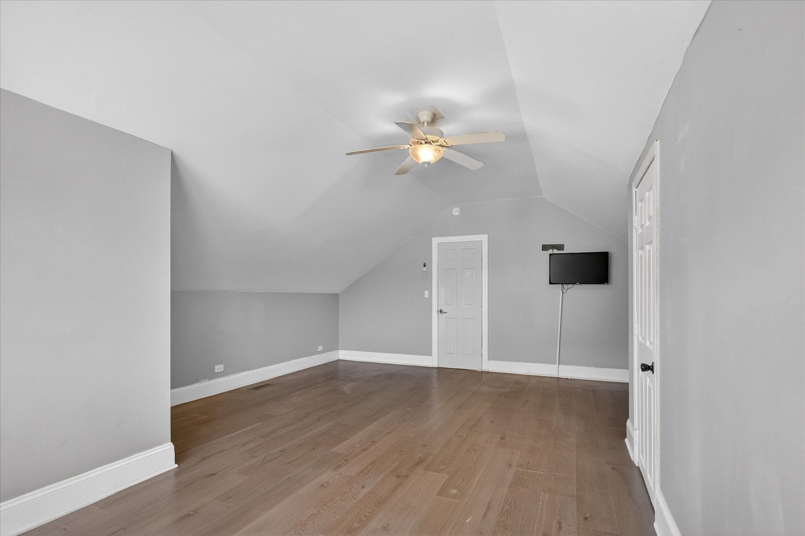 1 East 114th Street Chicago, IL 60628 - Photo 16 of 33 wooden floor in an empty room with a window