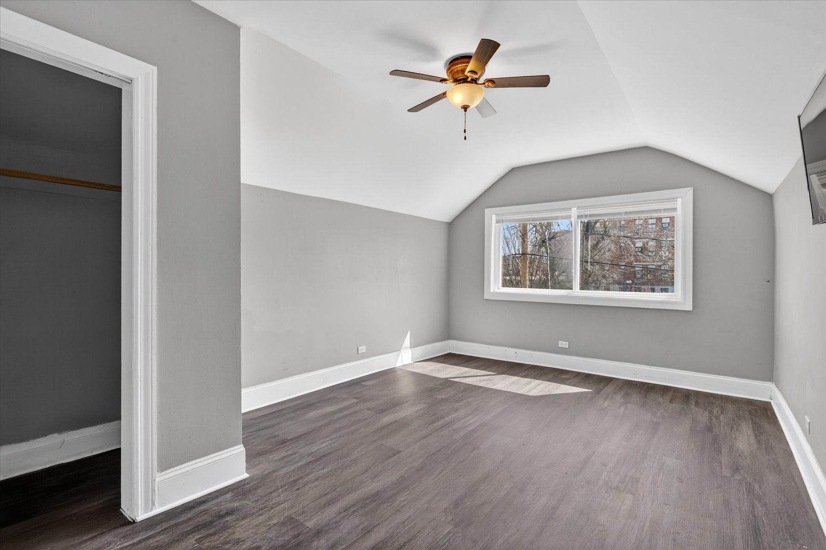 1 East 114th Street Chicago, IL 60628 - Photo 23 of 33 an empty room with wooden floor chandelier and windows