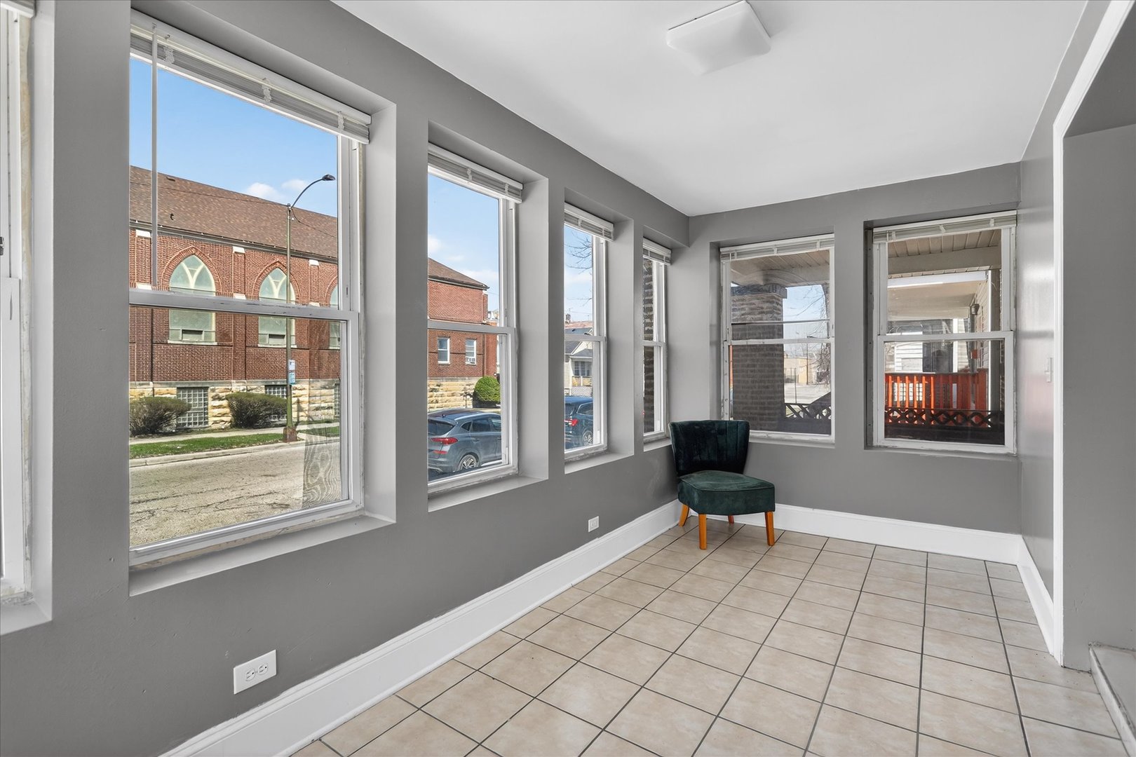 1 East 114th Street Chicago, IL 60628 - Photo 30 of 33 a living room with furniture and floor to ceiling windows
