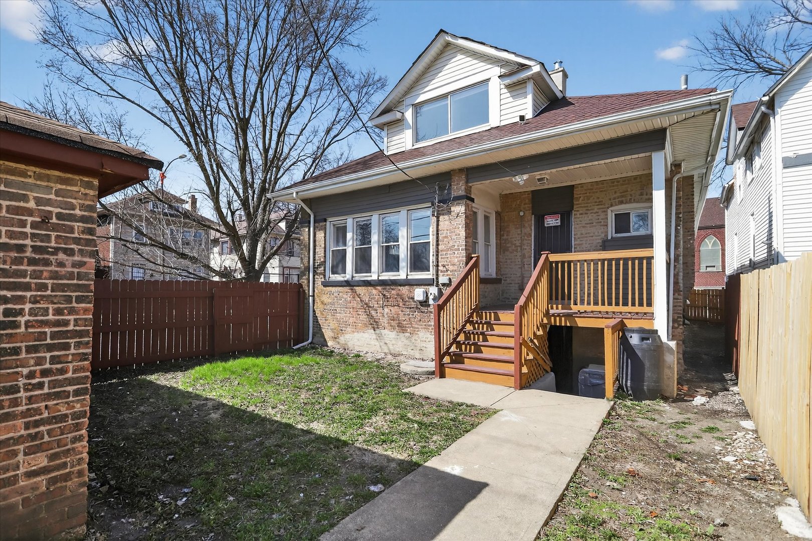 1 East 114th Street Chicago, IL 60628 - Photo 31 of 33 front view of a house with a yard