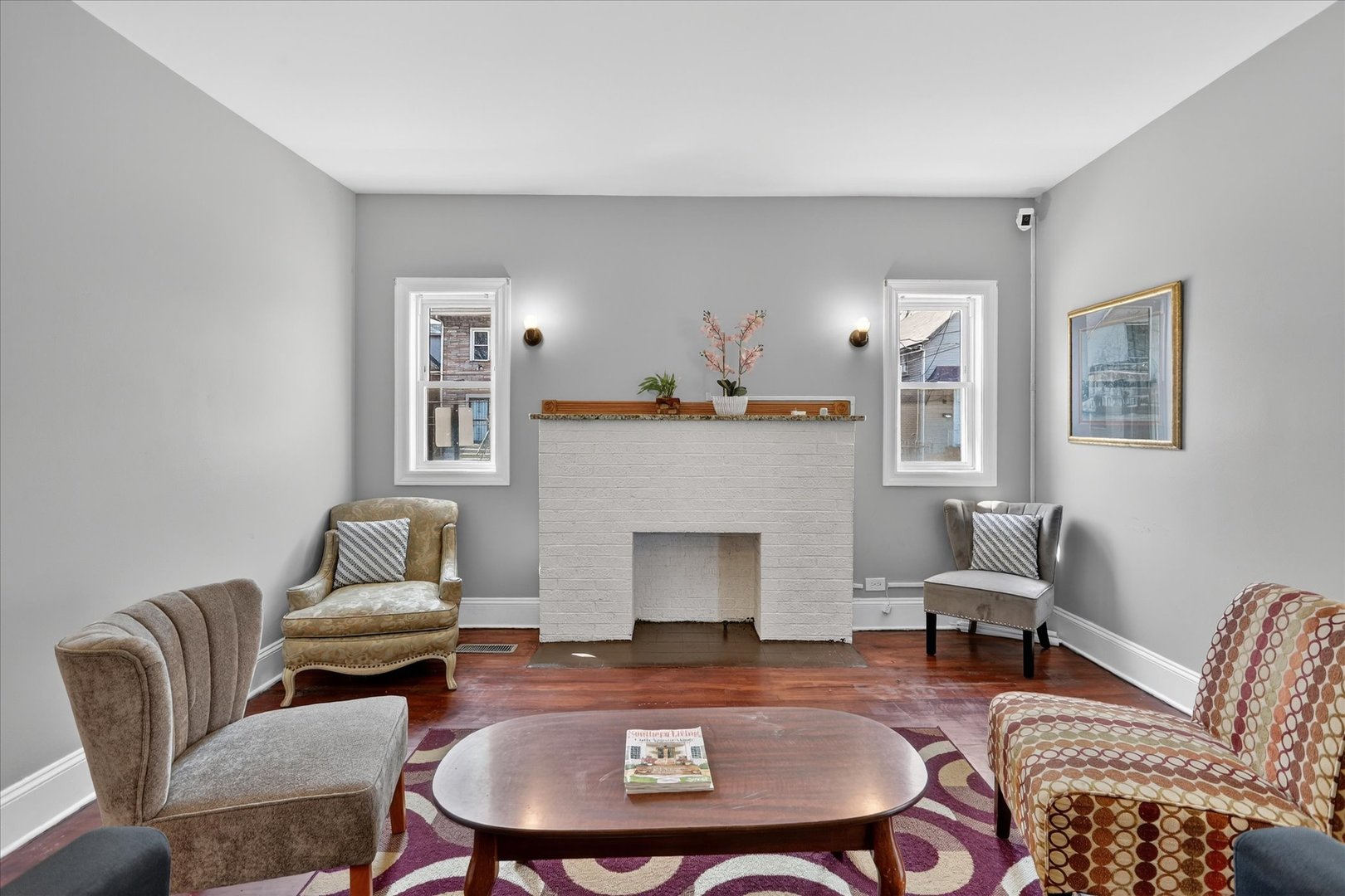 1 East 114th Street Chicago, IL 60628 - Photo 6 of 33 a living room with furniture and a fireplace