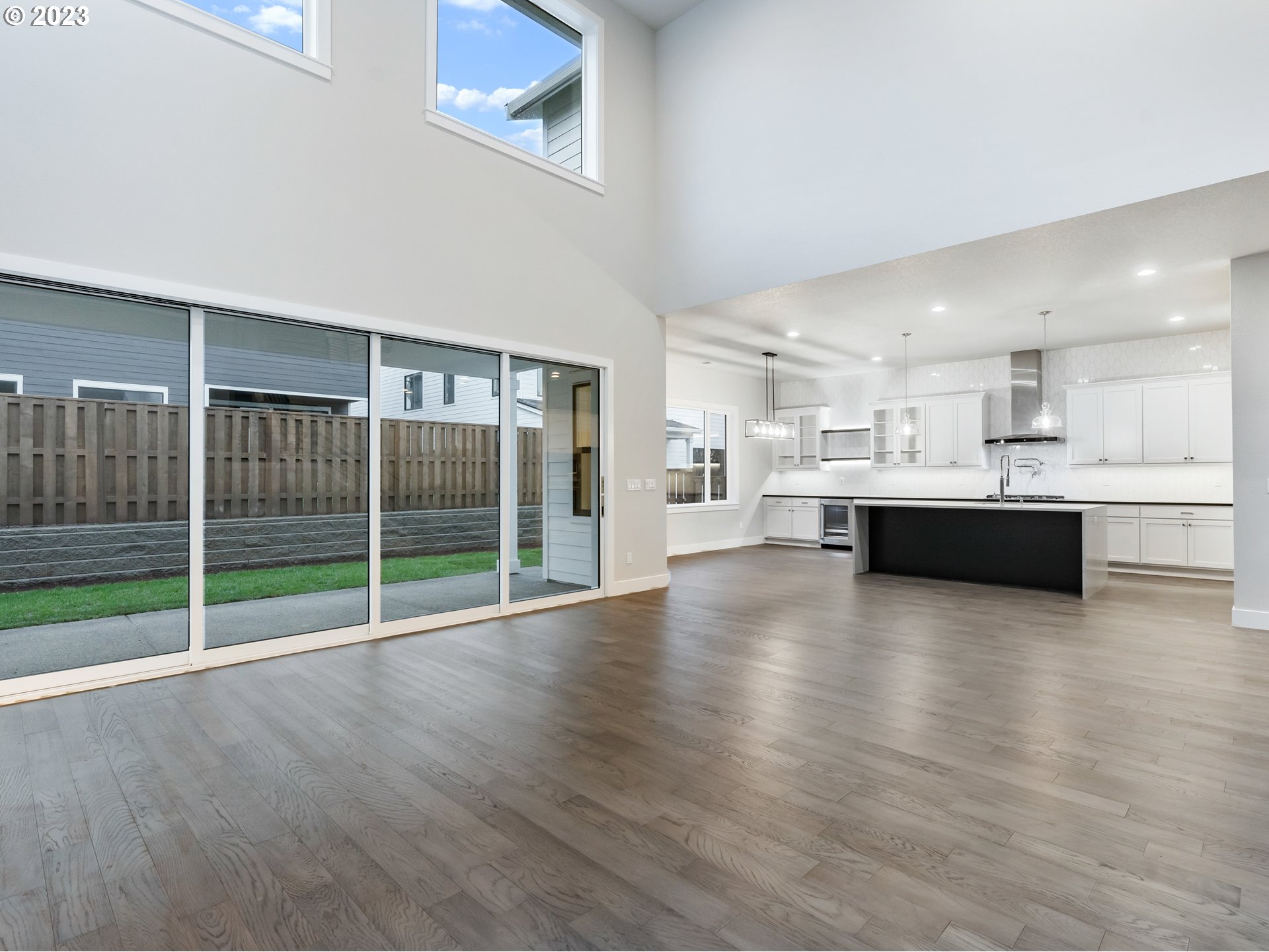 16084 Northwest Ridgeline Street, Unit L 72 Portland, OR 97229 - Photo 13 of 25 a view of a kitchen with wooden floor and a kitchen