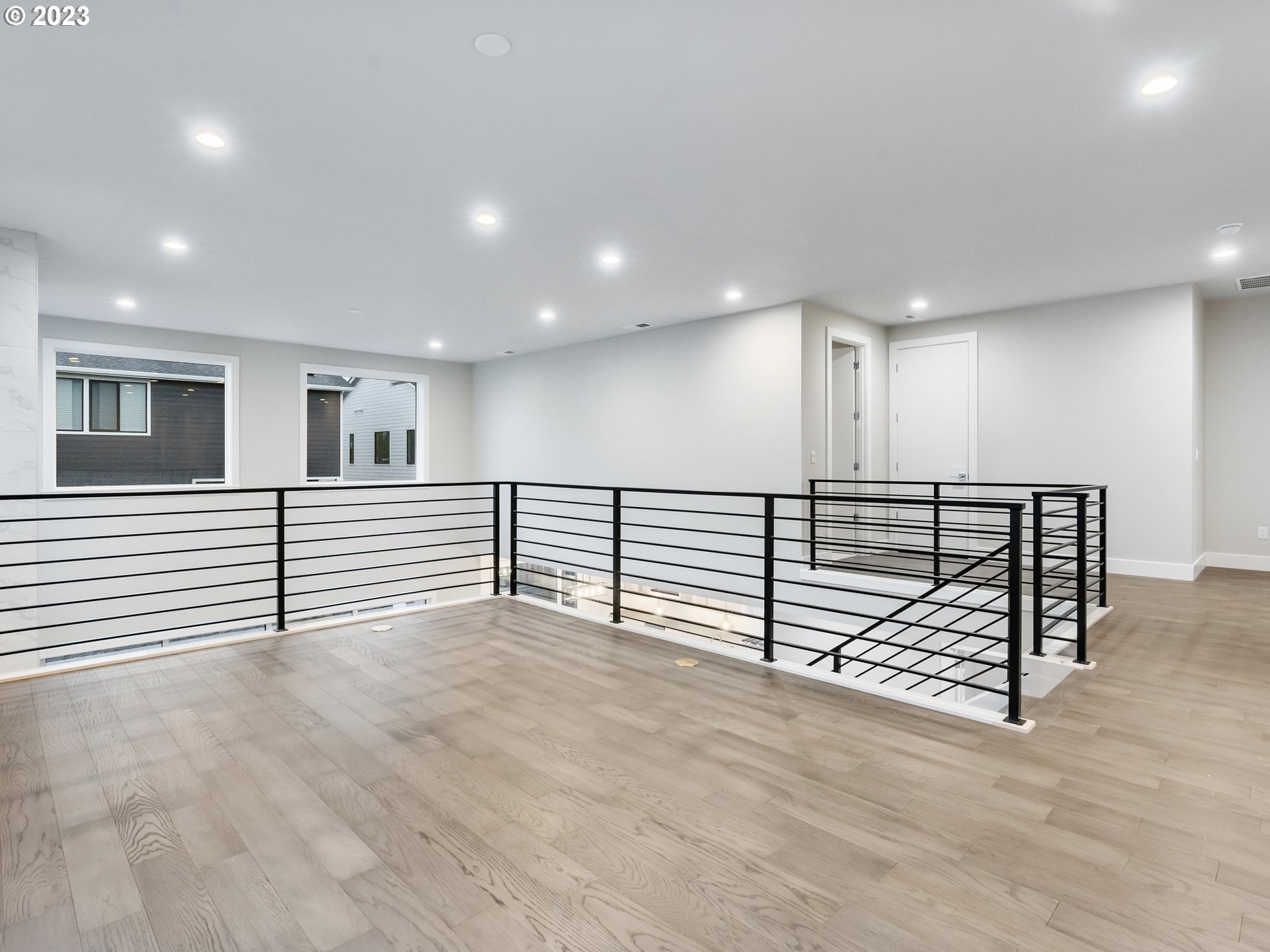 16084 Northwest Ridgeline Street, Unit L 72 Portland, OR 97229 - Photo 22 of 25 a view of a hallway