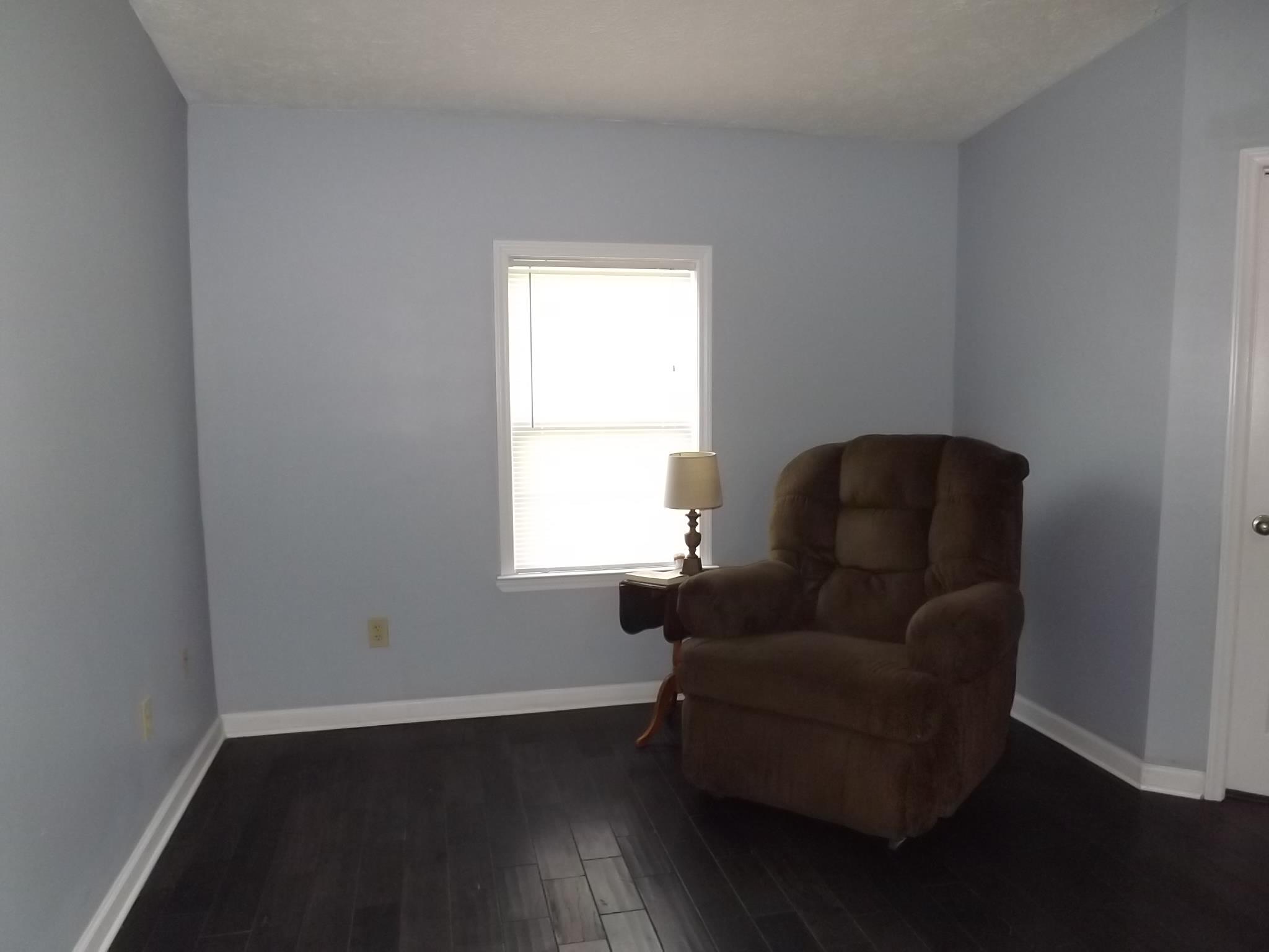 614 Ferrells Loop Road Beechgrove, TN 37018 - Photo 15 of 28 a living room with furniture and a window