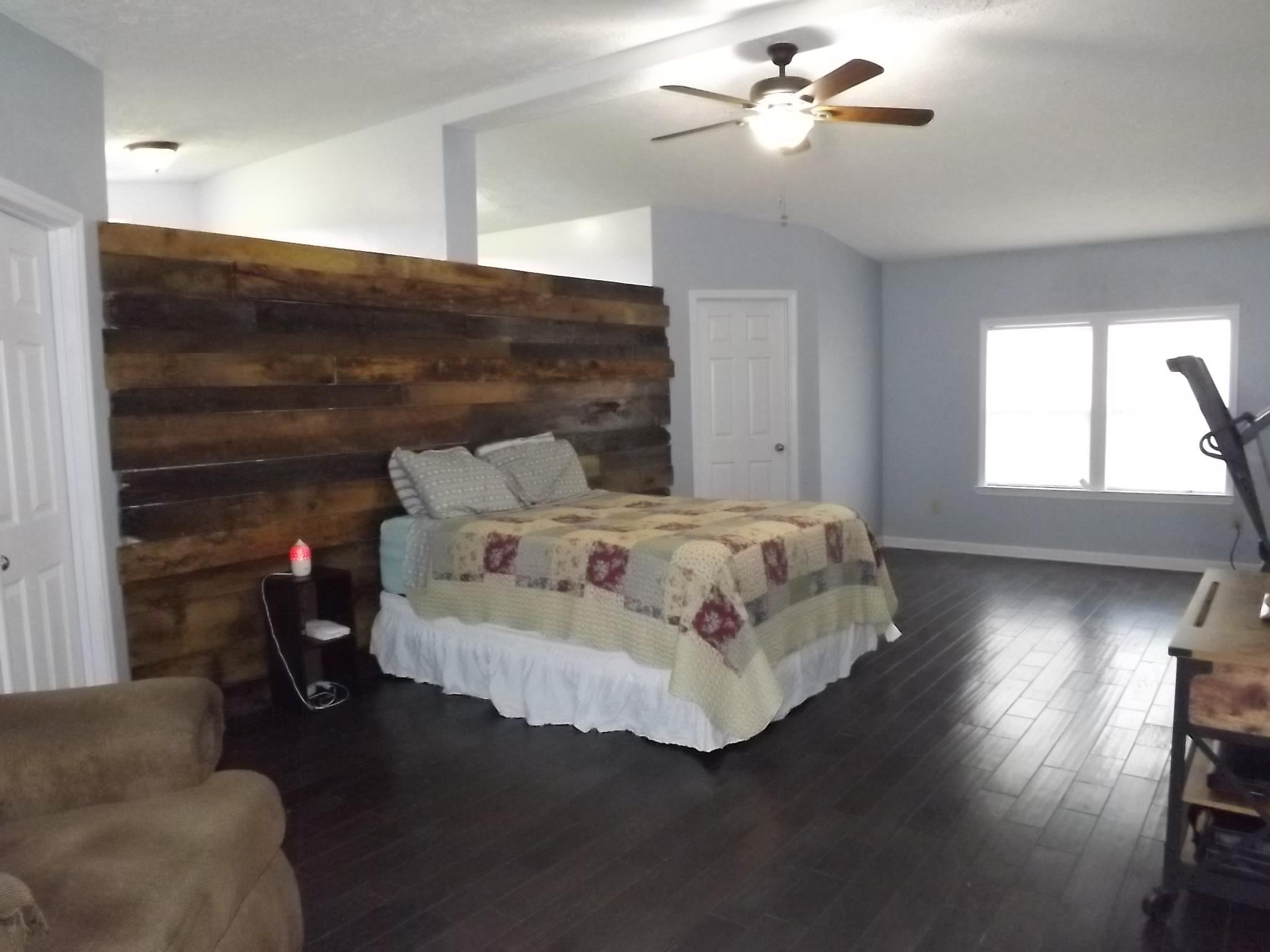 614 Ferrells Loop Road Beechgrove, TN 37018 - Photo 16 of 28 a bedroom with a bed and window
