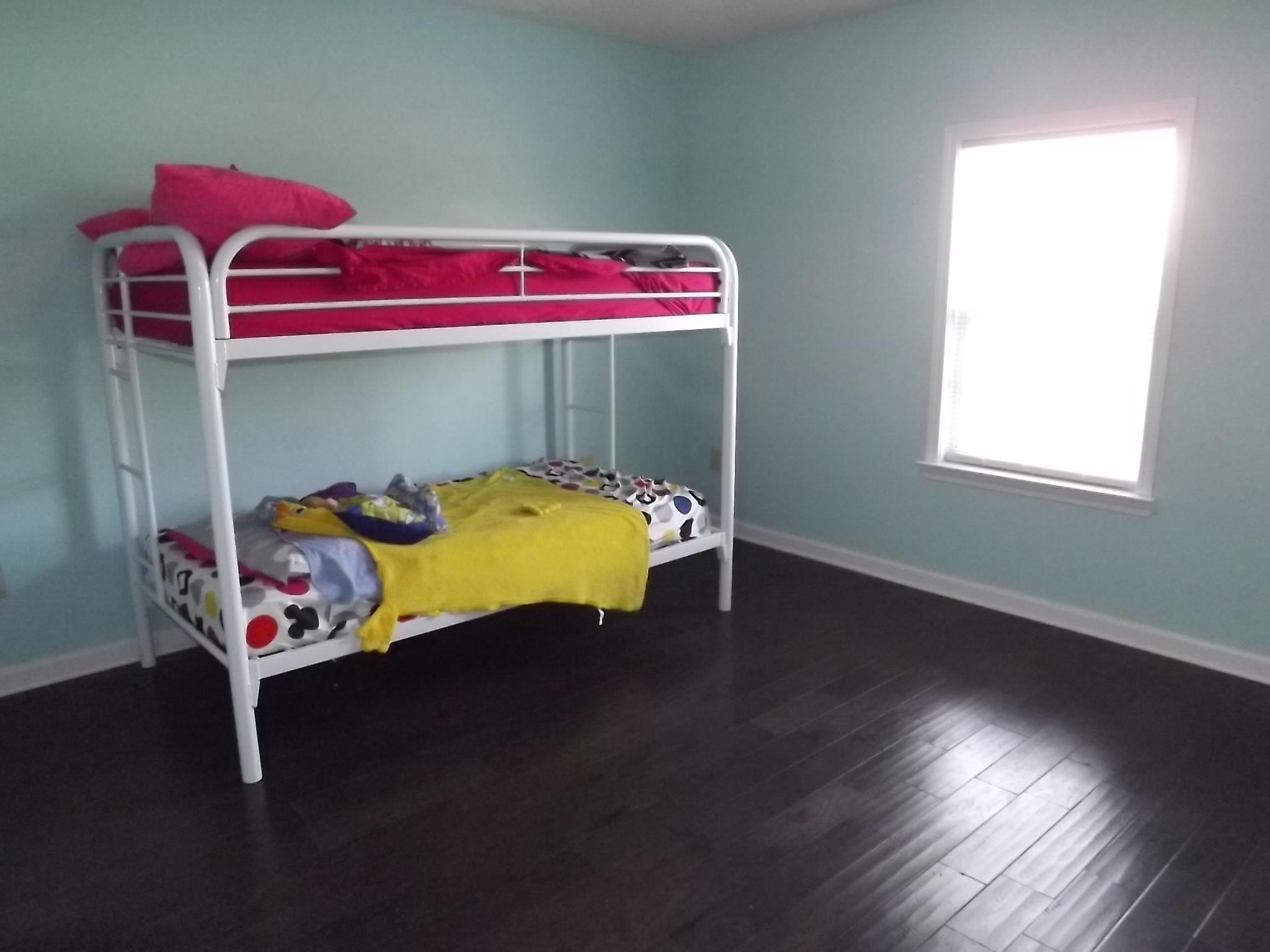 614 Ferrells Loop Road Beechgrove, TN 37018 - Photo 22 of 28 a bed room with a bed and a window
