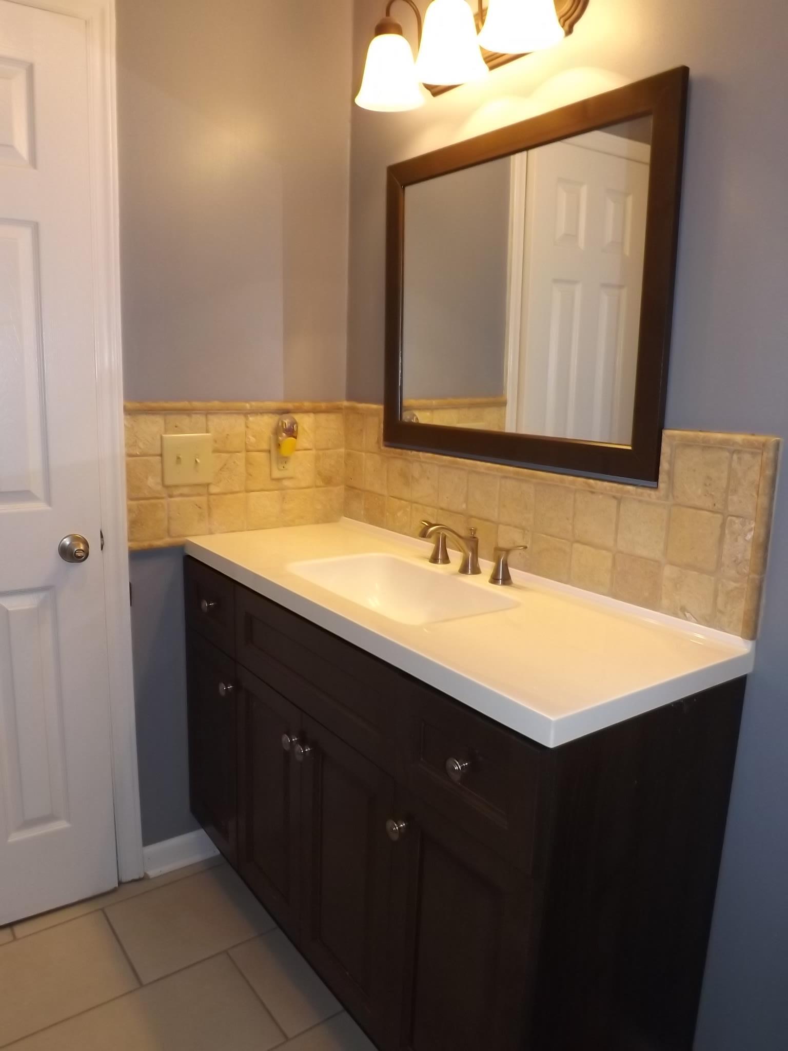 614 Ferrells Loop Road Beechgrove, TN 37018 - Photo 24 of 28 a bathroom with a sink vanity and a mirror