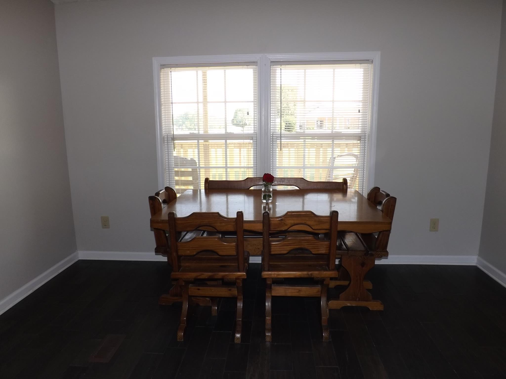 614 Ferrells Loop Road Beechgrove, TN 37018 - Photo 6 of 28 a view of a dining room with furniture and wooden floor