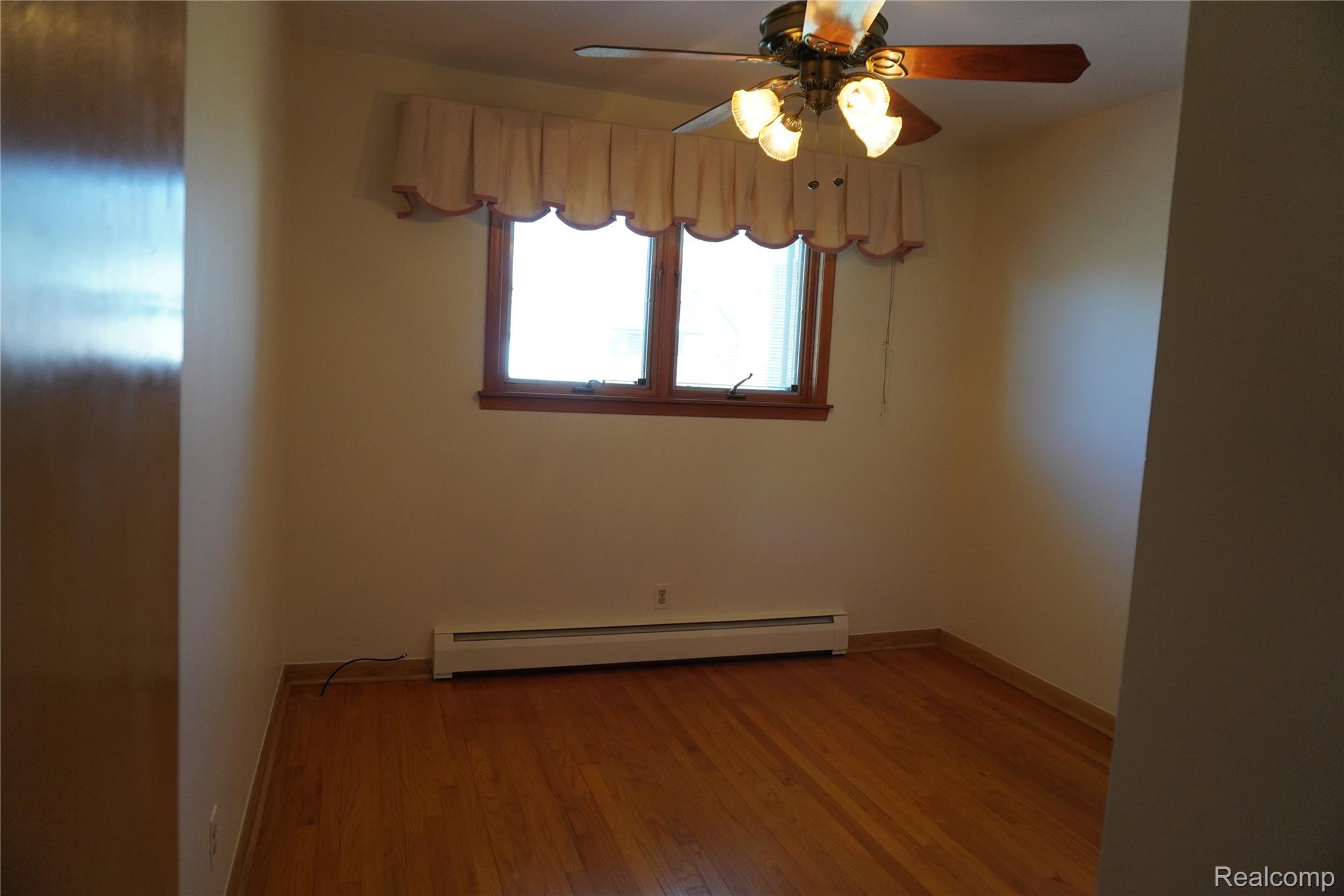 8115 Busch Street Center Line, MI 48015 - Photo 16 of 19 Bedroom with Hardwood floors, freshly painted with Pella Window