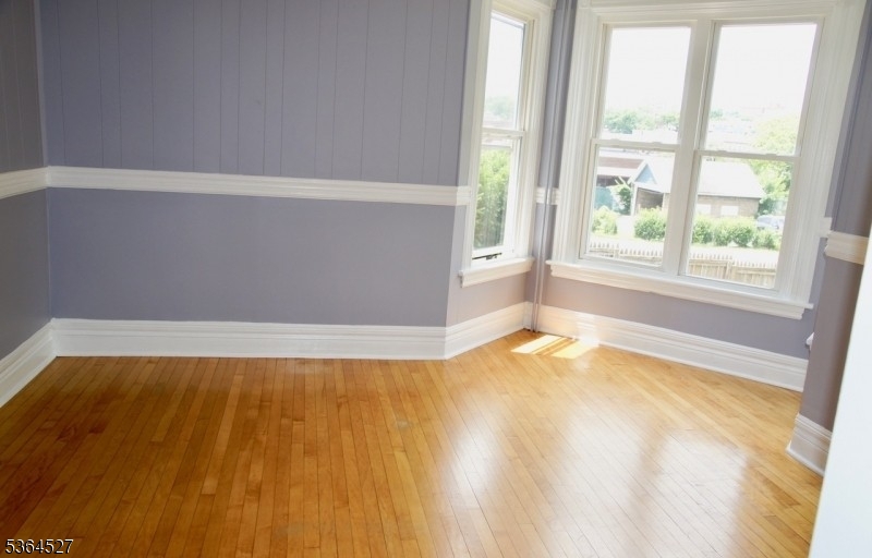 76 Grove Street Montclair, NJ 07042 - Photo 3 of 15 a view of an empty room with a window