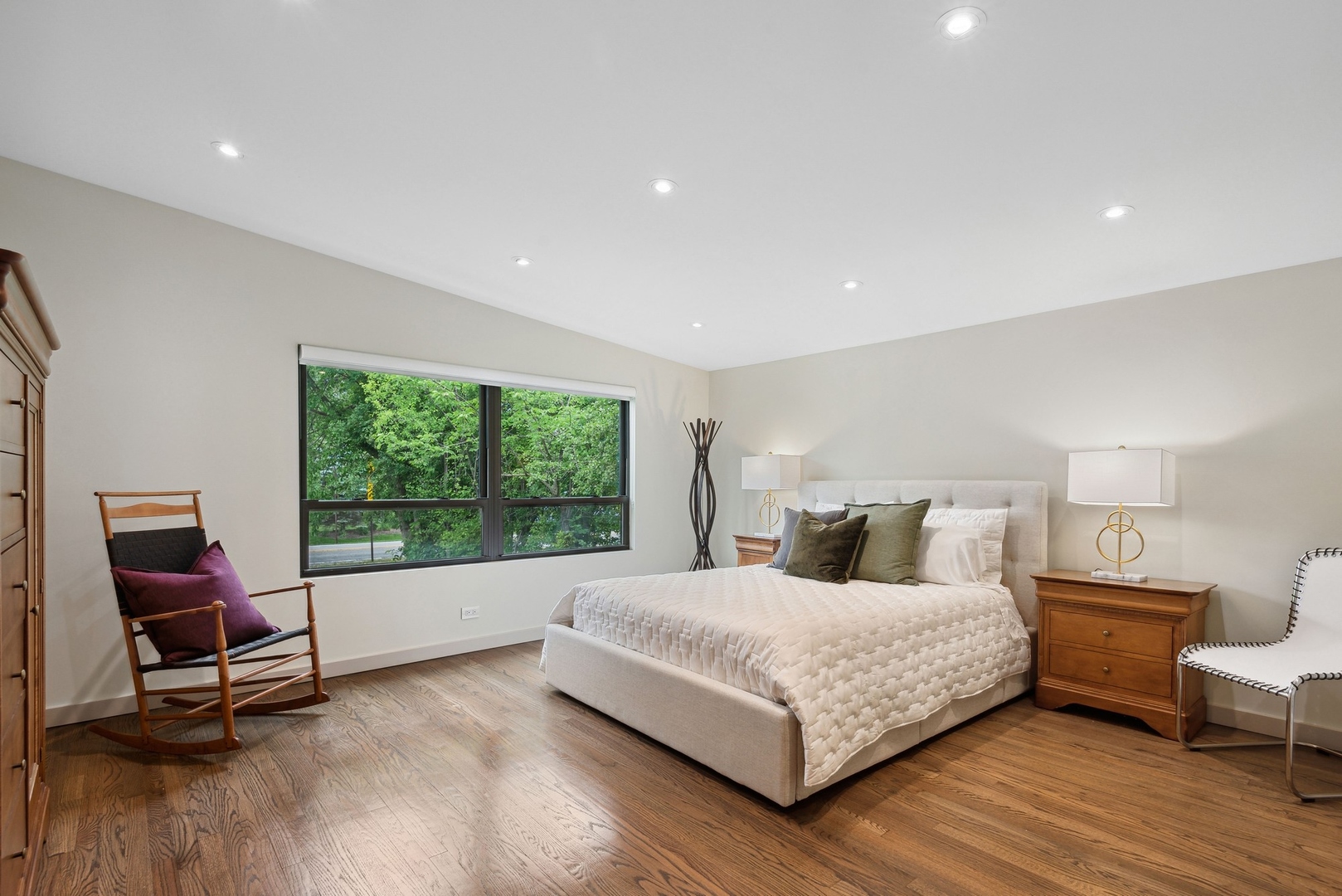1231 Ridge Road Highland Park, IL 60035 - Photo 12 of 30 a bedroom with a bed and large windows