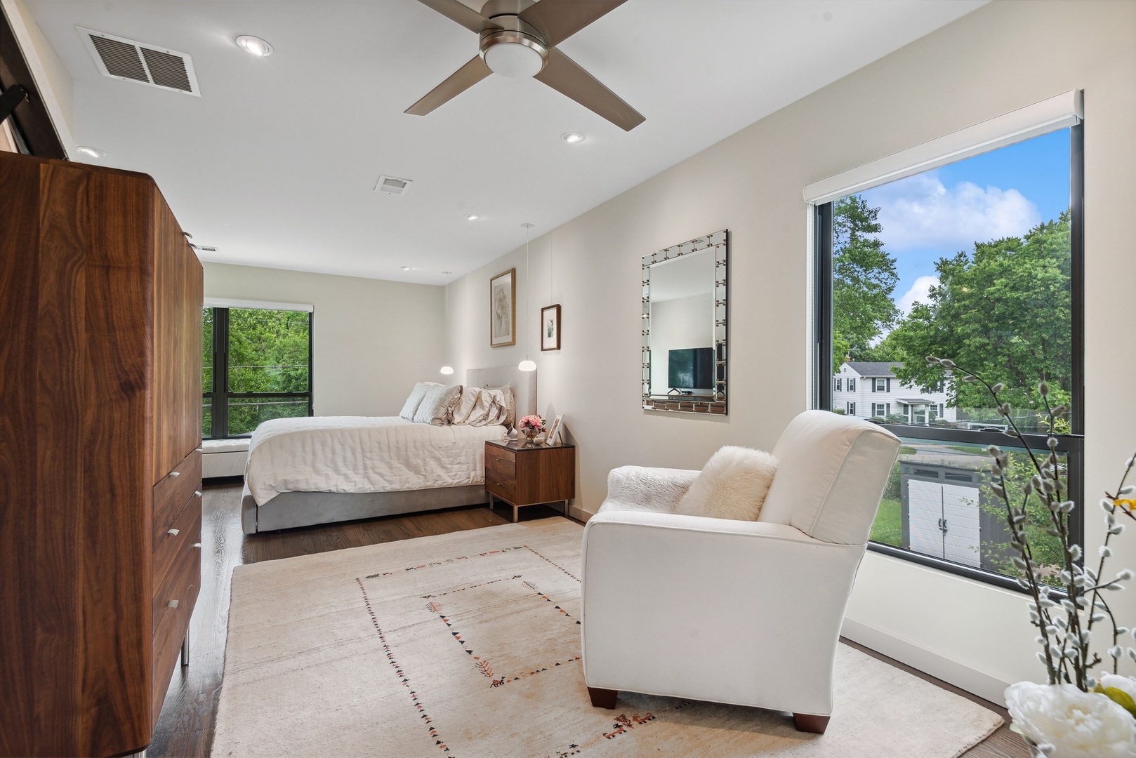 1231 Ridge Road Highland Park, IL 60035 - Photo 16 of 30 a bedroom with a large bed couch and windows