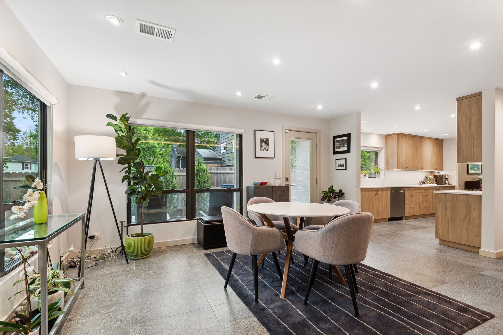1231 Ridge Road Highland Park, IL 60035 - Photo 7 of 30 a view of a dining room with furniture water view and wooden floor