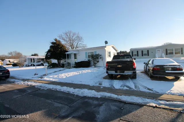 a car parked in front of a house