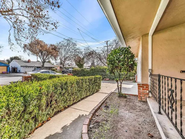 a view of a pathway with a bench