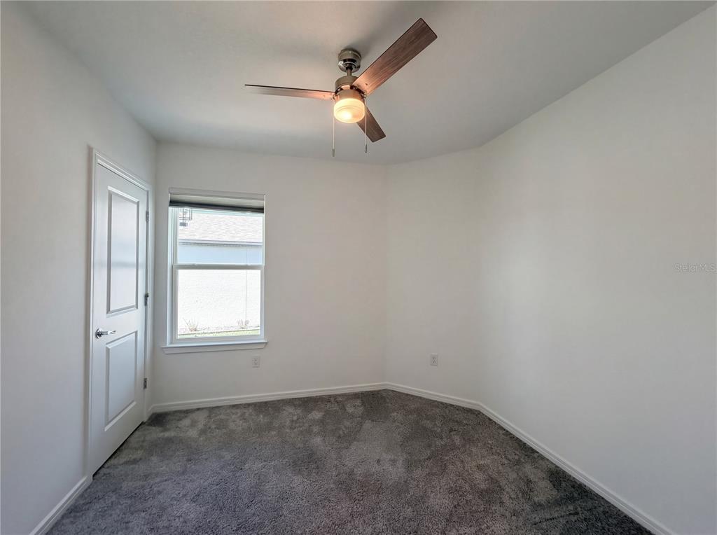8359 Southwest 54th Street Ocala, FL 34481 - Photo 20 of 26 an empty room with a window