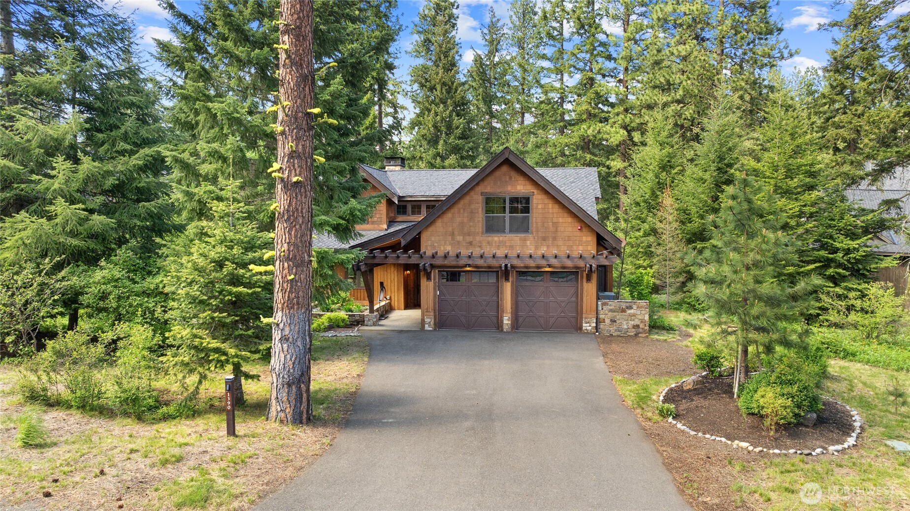 1390 Snowberry Loop Cle Elum, WA 98922 - Photo 2 of 40 a house with a tree in the background