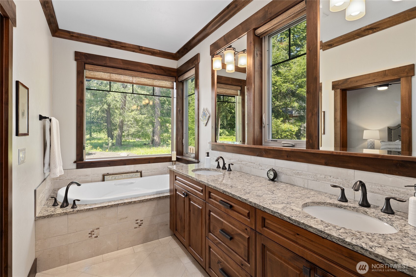 1390 Snowberry Loop Cle Elum, WA 98922 - Photo 24 of 40 a bathroom with double vanity sink a mirror and a window