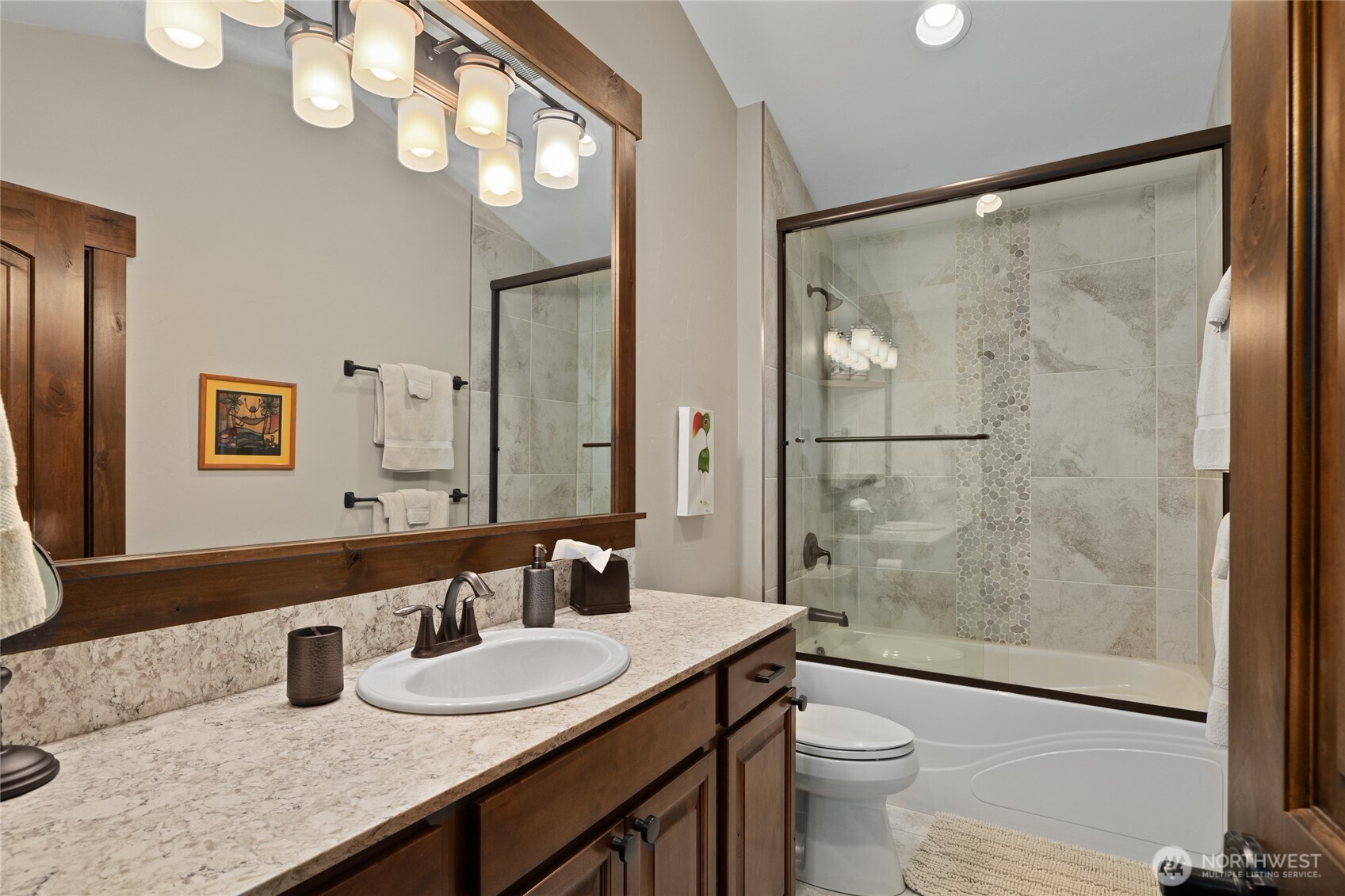 1390 Snowberry Loop Cle Elum, WA 98922 - Photo 31 of 40 a bathroom with a granite countertop sink a toilet a mirror and shower