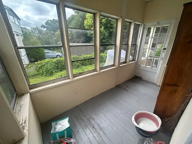 a view of livingroom with furniture window and wooden floor