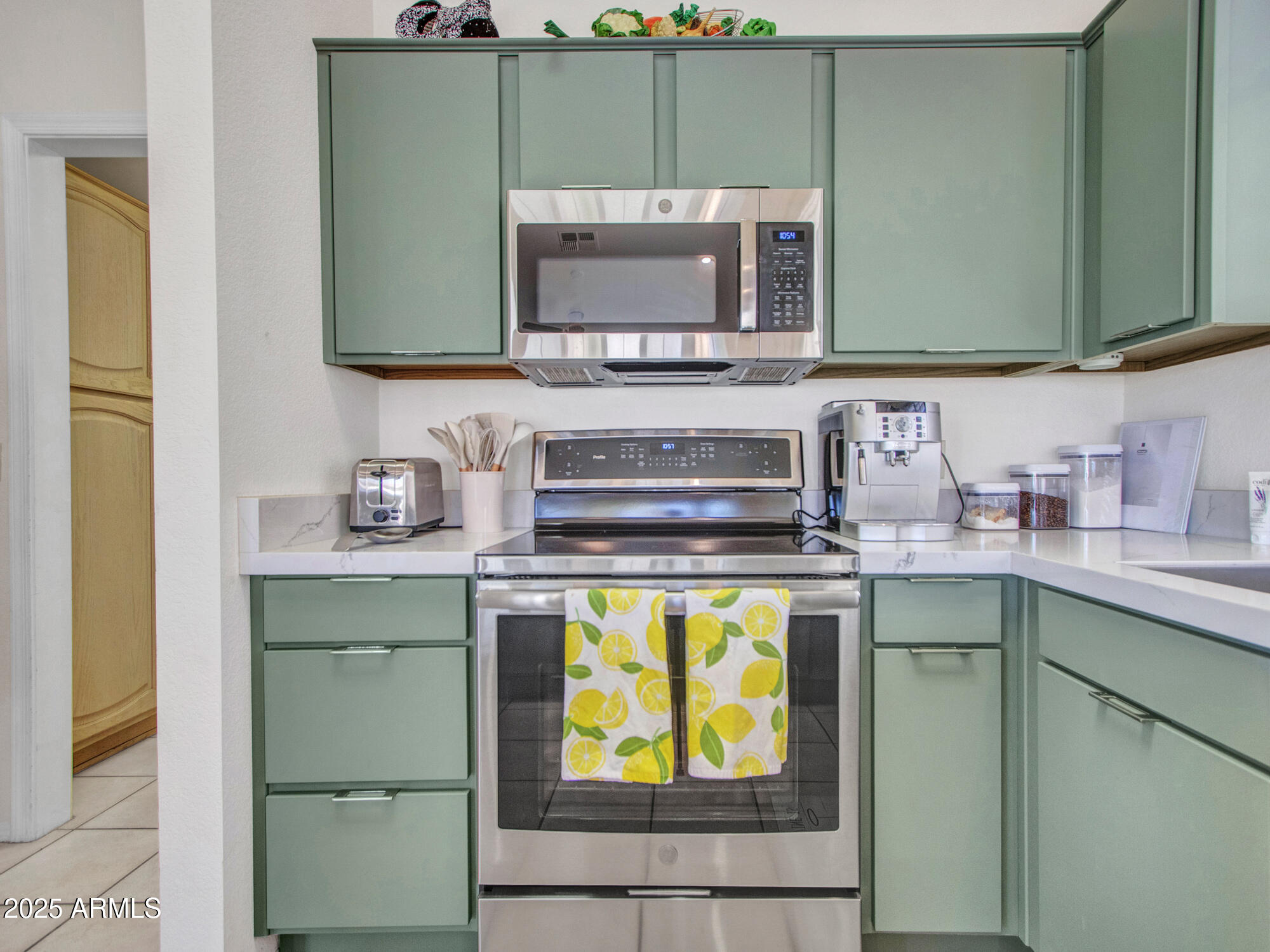 9343 West Escuda Drive Peoria, AZ 85382 - Photo 10 of 51 a kitchen with a sink and cabinets
