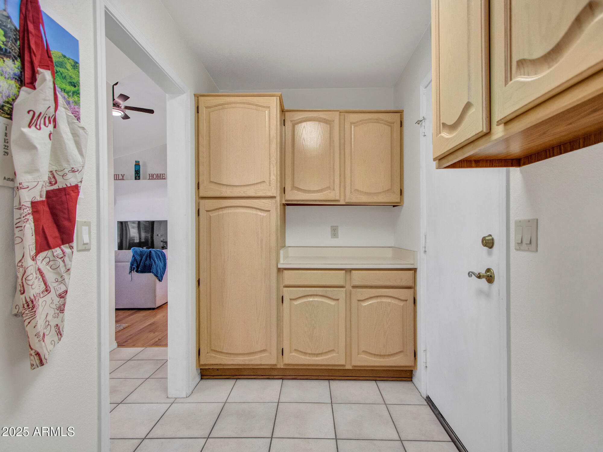 9343 West Escuda Drive Peoria, AZ 85382 - Photo 19 of 51 a white refrigerator freezer and a stove sitting inside of a kitchen