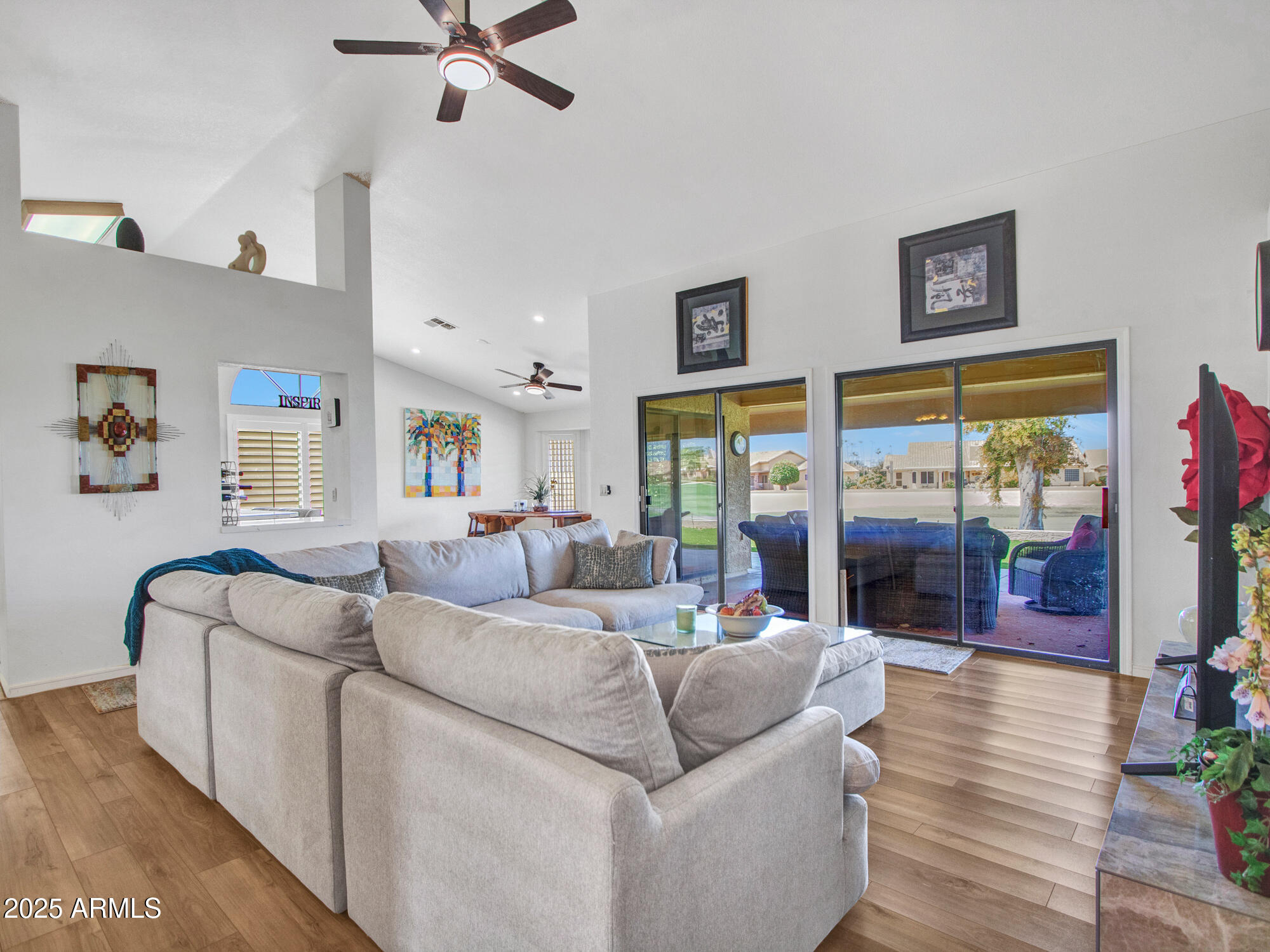 9343 West Escuda Drive Peoria, AZ 85382 - Photo 21 of 51 a living room with furniture and a large window