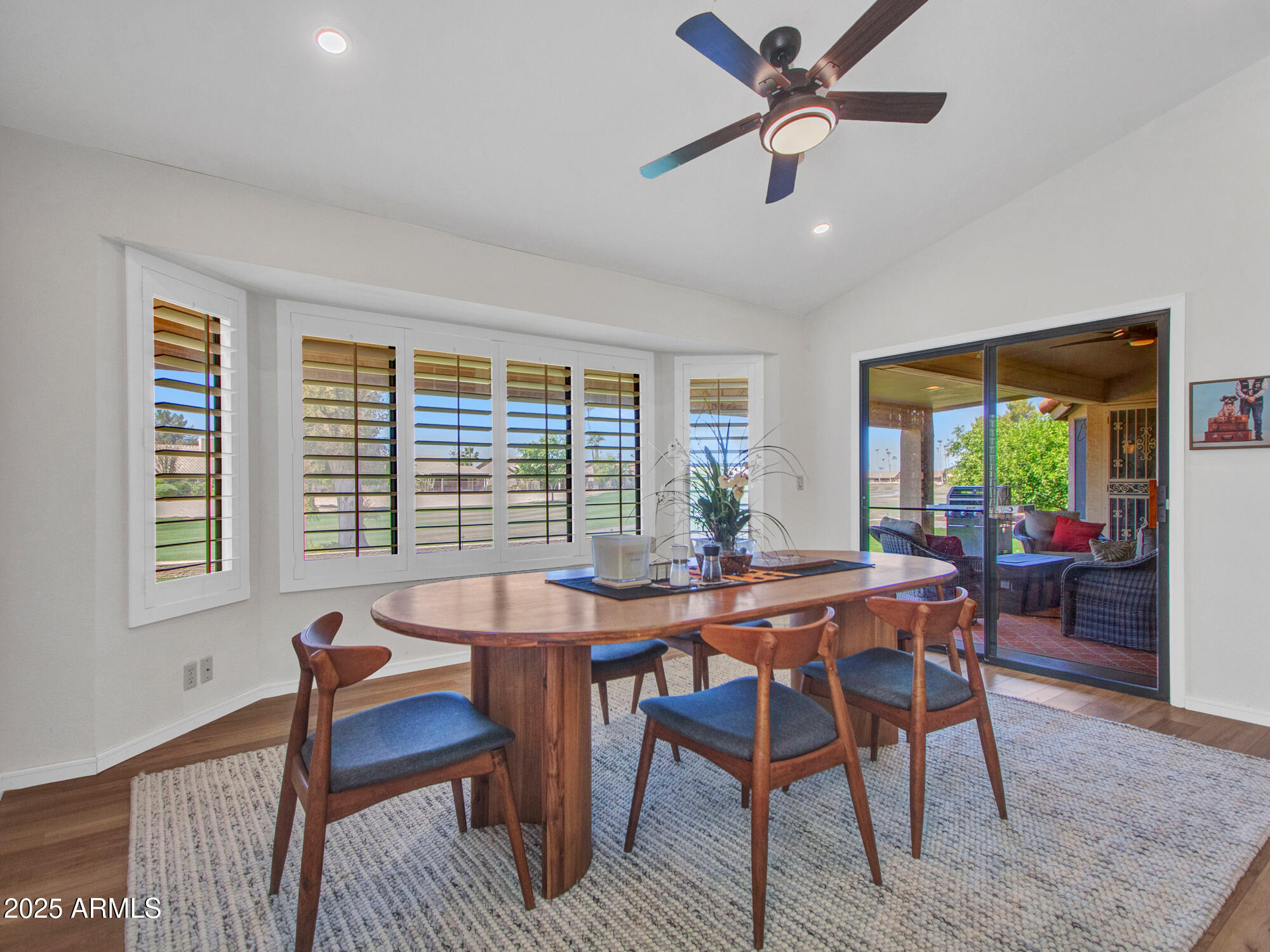9343 West Escuda Drive Peoria, AZ 85382 - Photo 36 of 51 a view of a dining room with furniture window and outside view