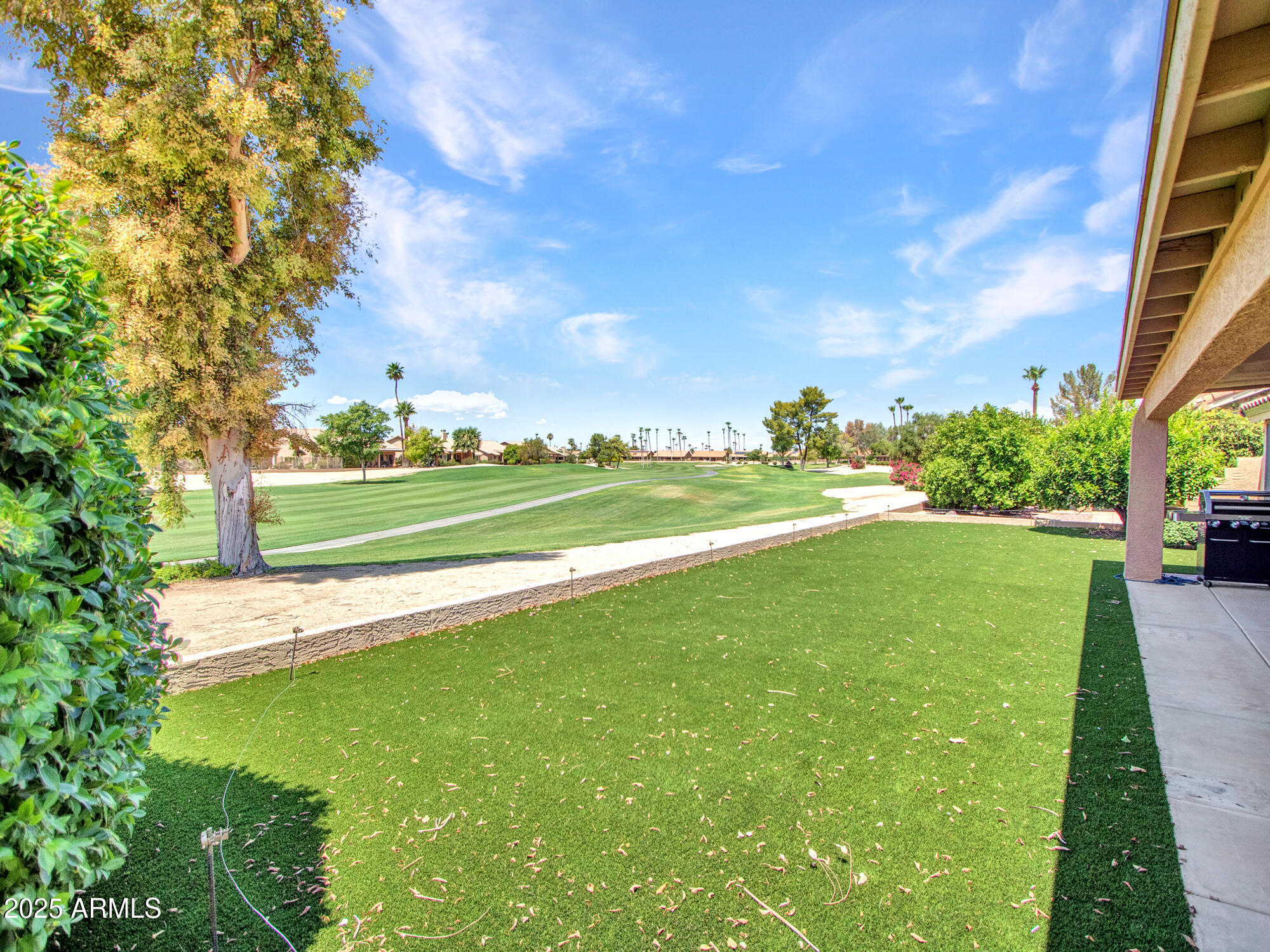 9343 West Escuda Drive Peoria, AZ 85382 - Photo 40 of 51 a view of a golf course with a garden