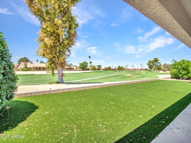 a view of a golf course with a garden