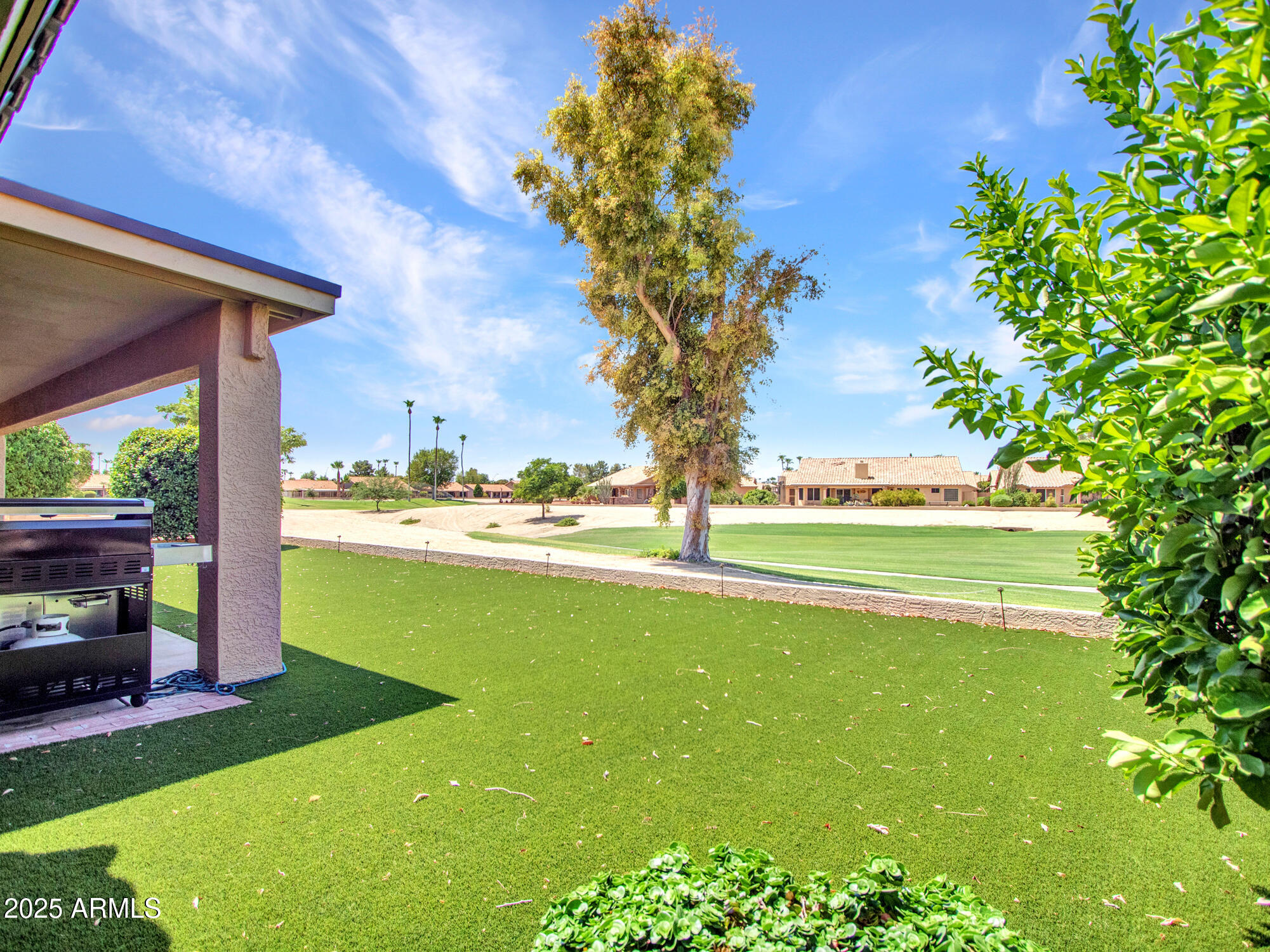9343 West Escuda Drive Peoria, AZ 85382 - Photo 45 of 51 a view of a house with a yard