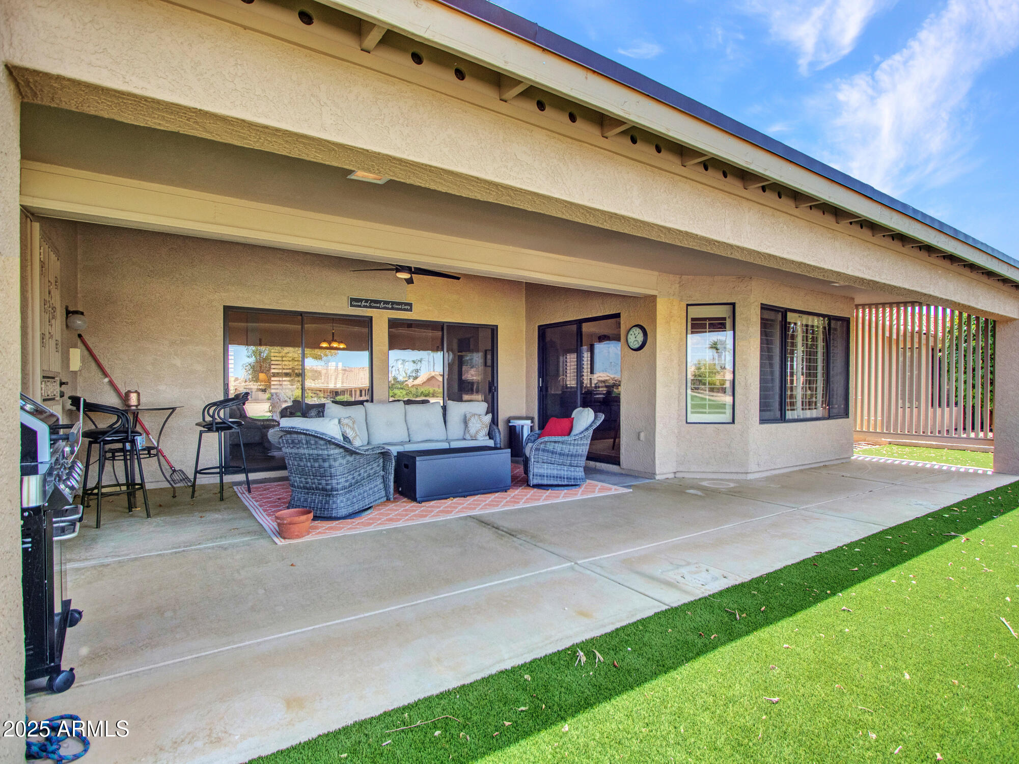 9343 West Escuda Drive Peoria, AZ 85382 - Photo 49 of 51 a view of a room with chairs and a porch