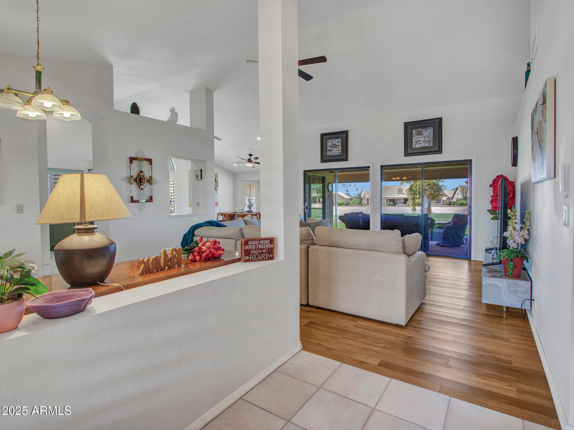 9343 West Escuda Drive Peoria, AZ 85382 - Photo 6 of 51 a living room with furniture and a wooden floor