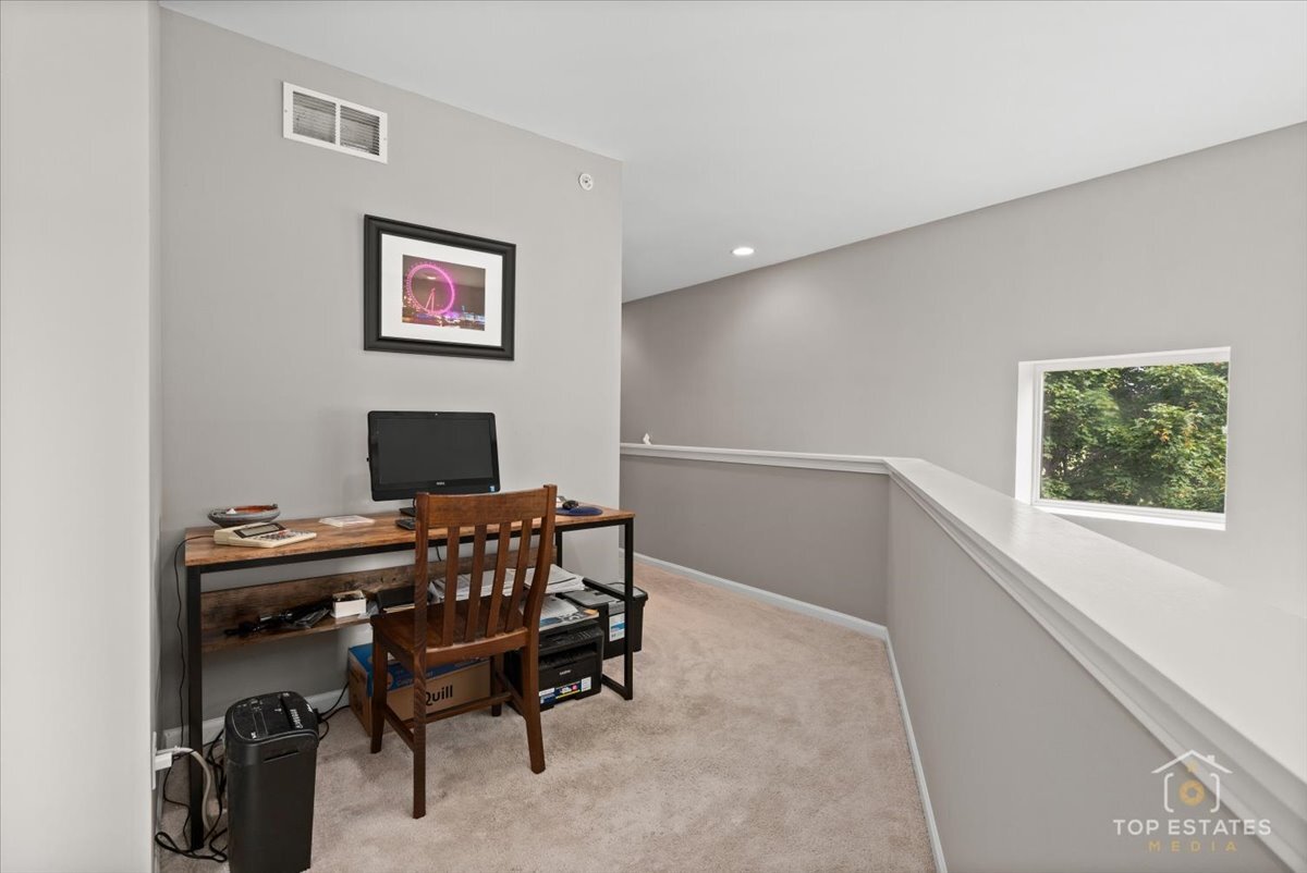 1651 Pauline Circle, Unit 1651 Mundelein, IL 60060 - Photo 20 of 42 a workspace with furniture and a window