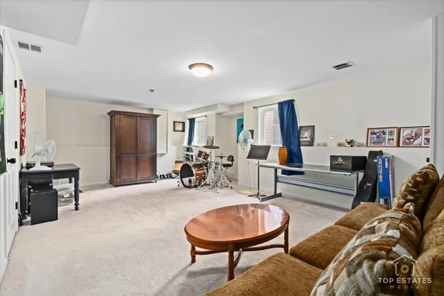 a view of a livingroom with furniture and a couch