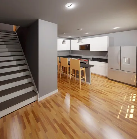 a view of kitchen with sink and microwave