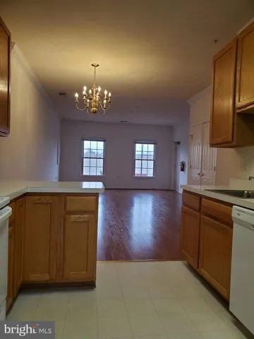 a view of kitchen and front door