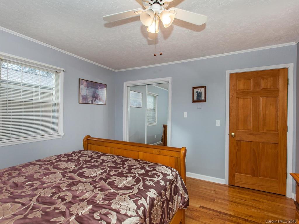 2533 Iron Duff Road Waynesville, NC 28785 - Photo 19 of 35 a bedroom with bed and window
